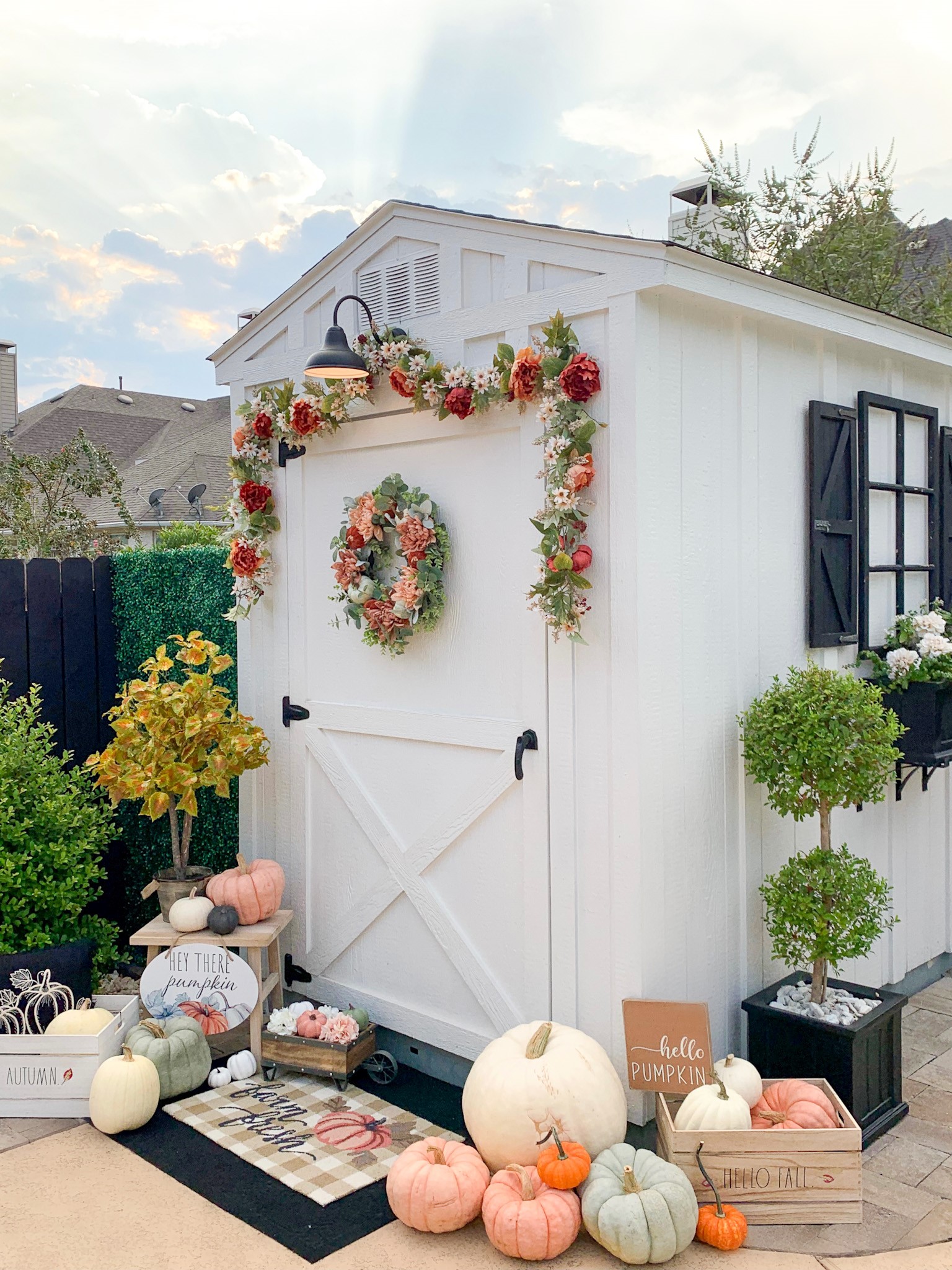 Farmhouse She Shed Decorated for Fall